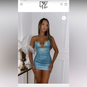 Teal sparkly cut out mini dress from the brand dressmezee.com